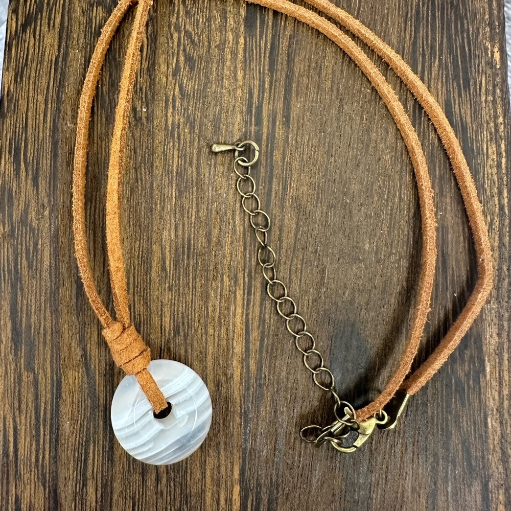 Small Banded White Agate Donut Pendant Necklace on Brown Suede - Picture 11 of 14